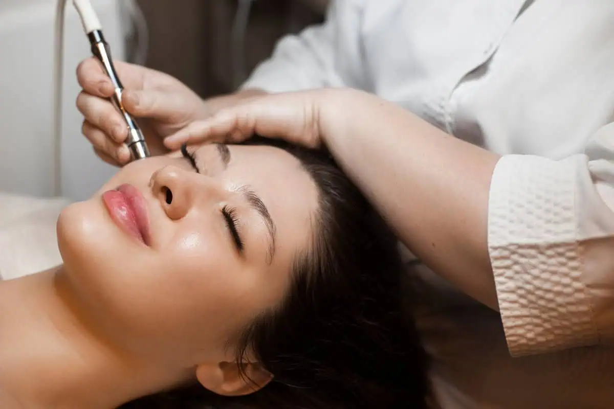 Young Woman Getting Microneedling Treatment in Beverly Hills